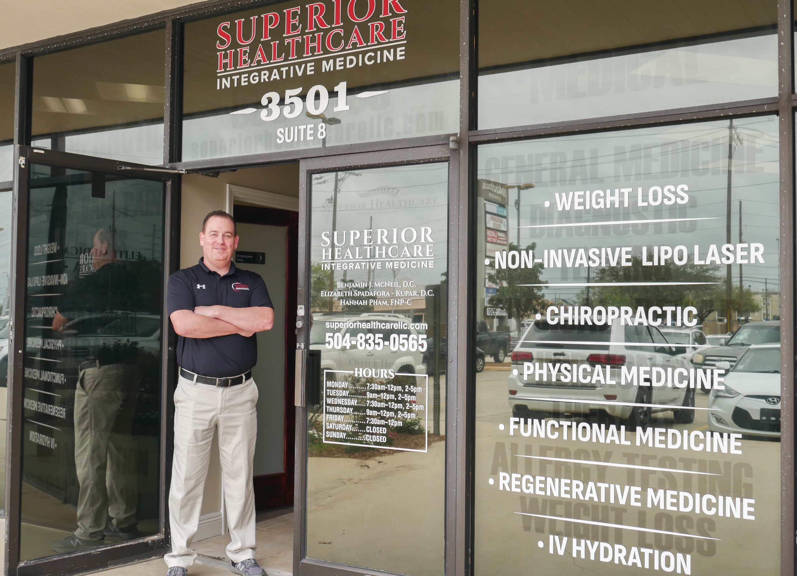 Dr. Benjamin J. McNeil striking welcome pose at the front door of Superior Healthcare - Chiropractor Metairie LA Dr. Benjamin J. McNeil striking welcome pose at the front door of Superior Healthcare - Chiropractor Metairie LA